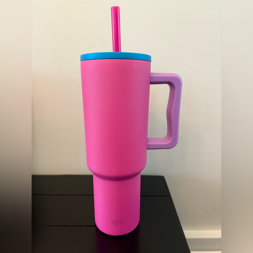 Bright Pink Insulated Travel Tumbler with Purple Handle and Blue Lid